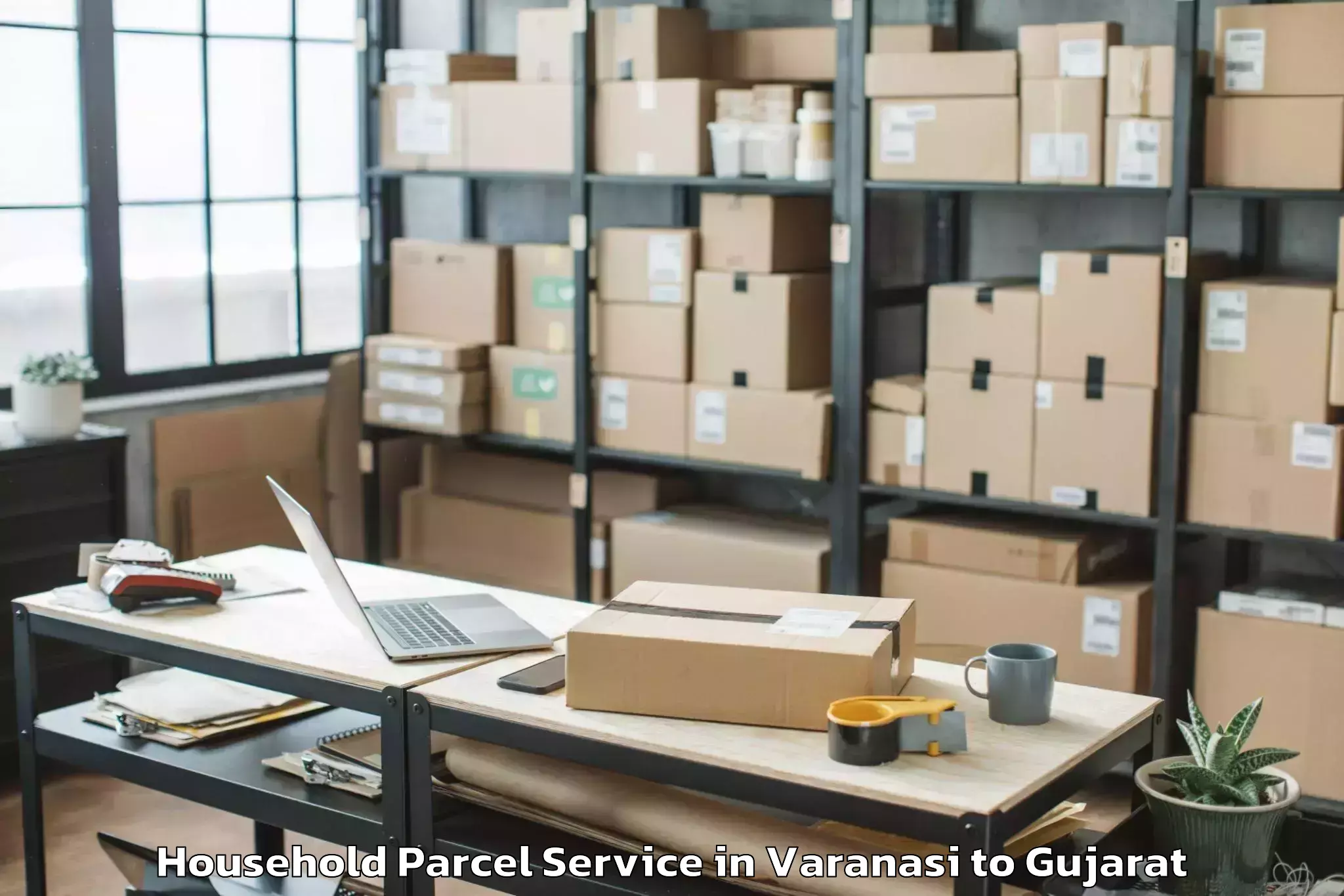 Book Varanasi to Ganpat University Mehsana Household Parcel Online